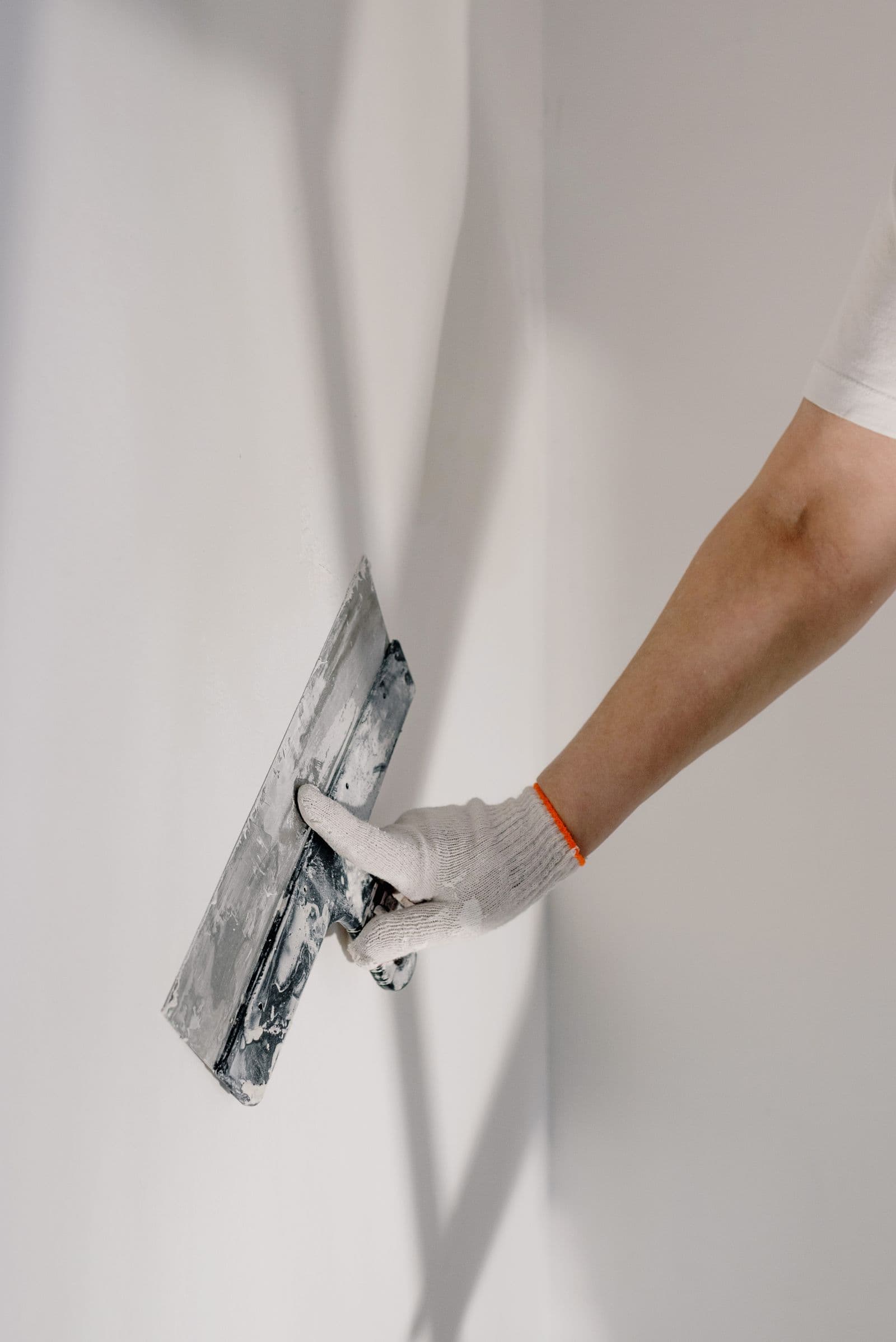 Painting team preparing a room for a professional finish